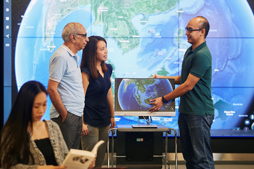 image of people in front of screen